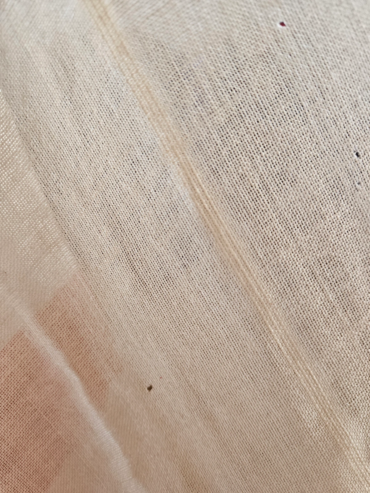 Backlit detail of ribbed wool texture