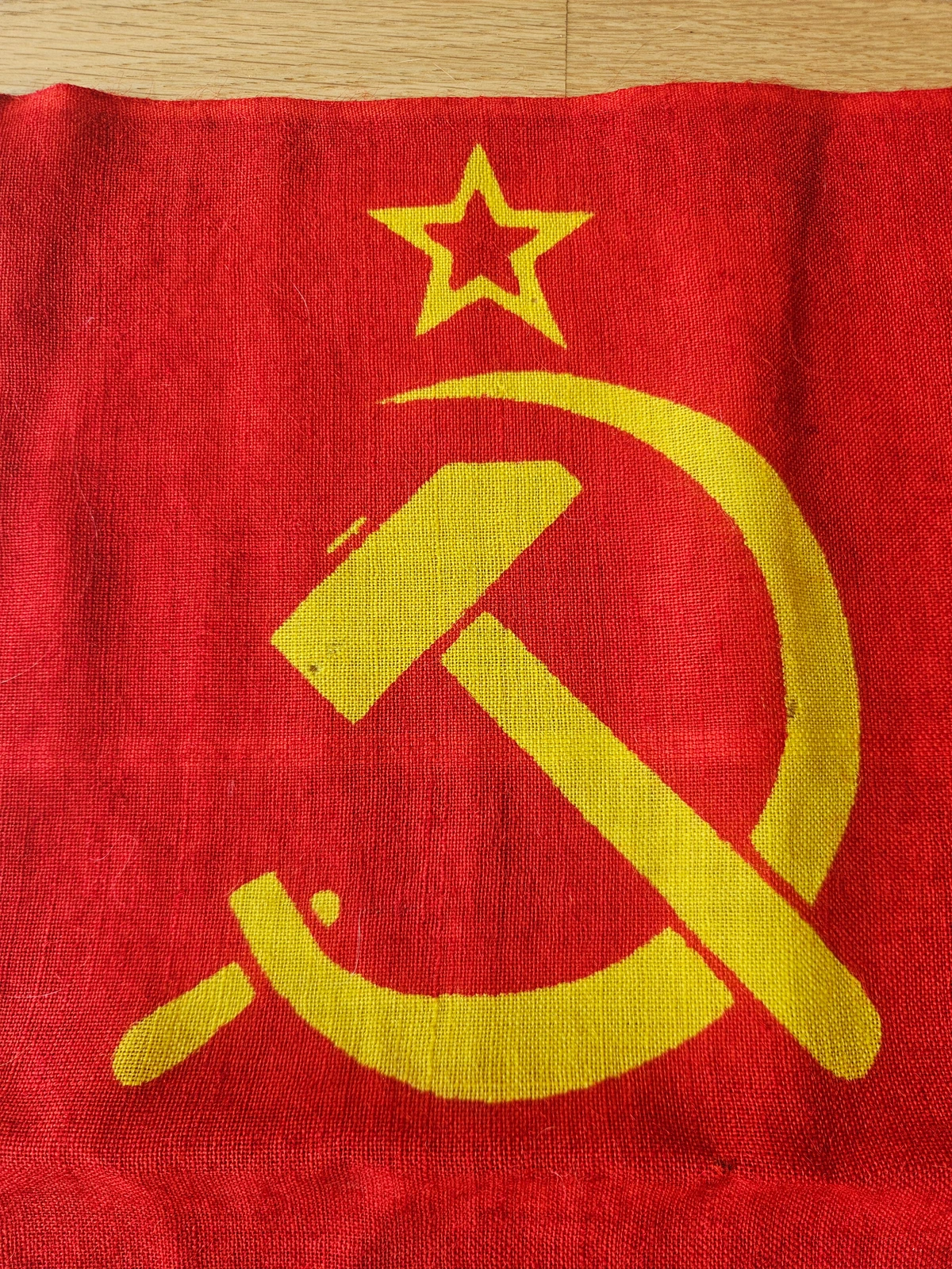 Detail of hammer and sickle print