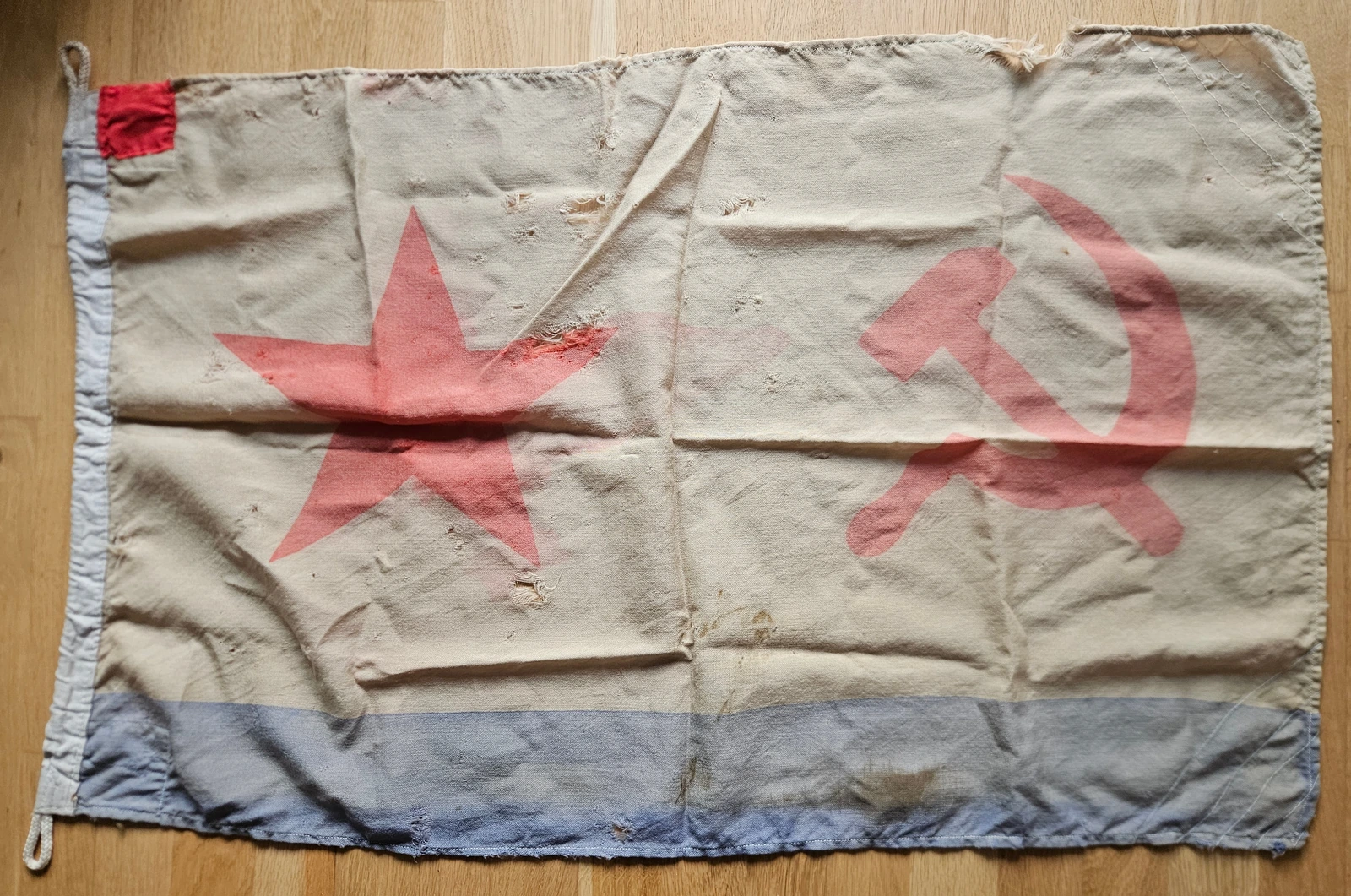 Reverse full view showing pigment through-print and fading on the star