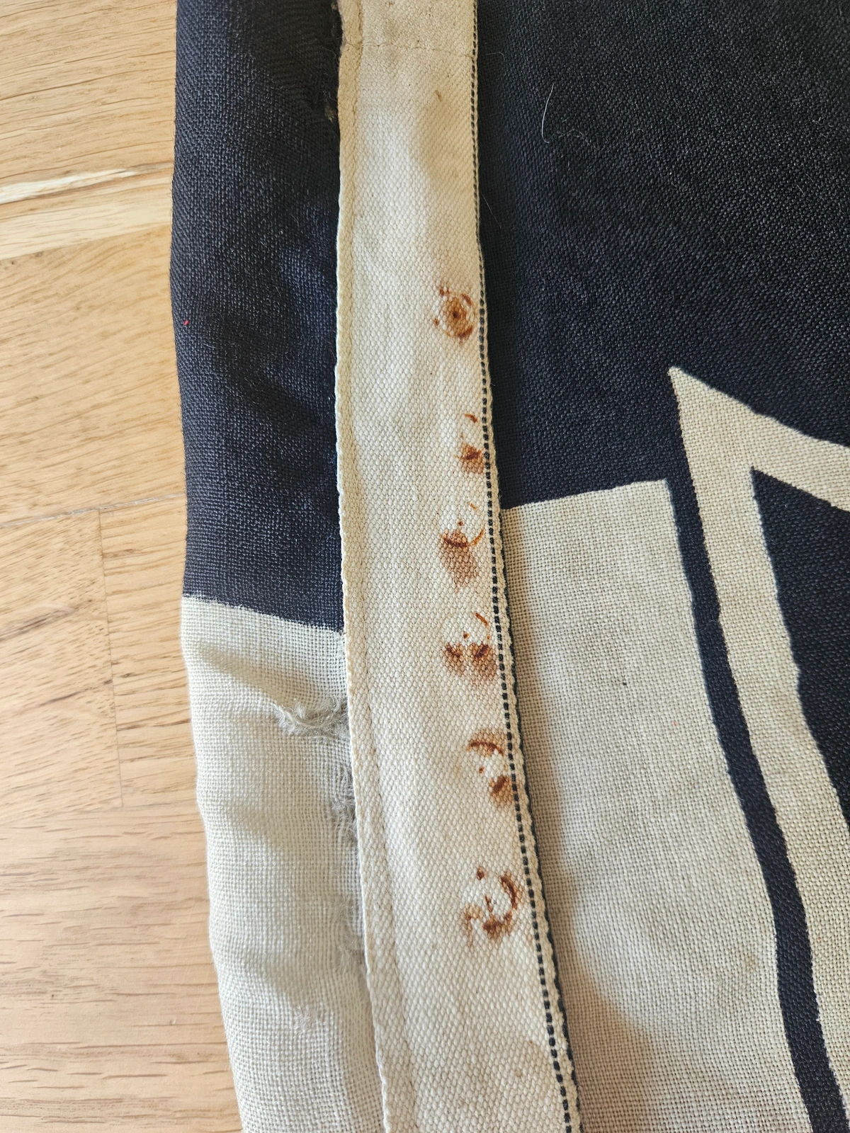 Hoist with cotton railroad header showing tack/rust marks.