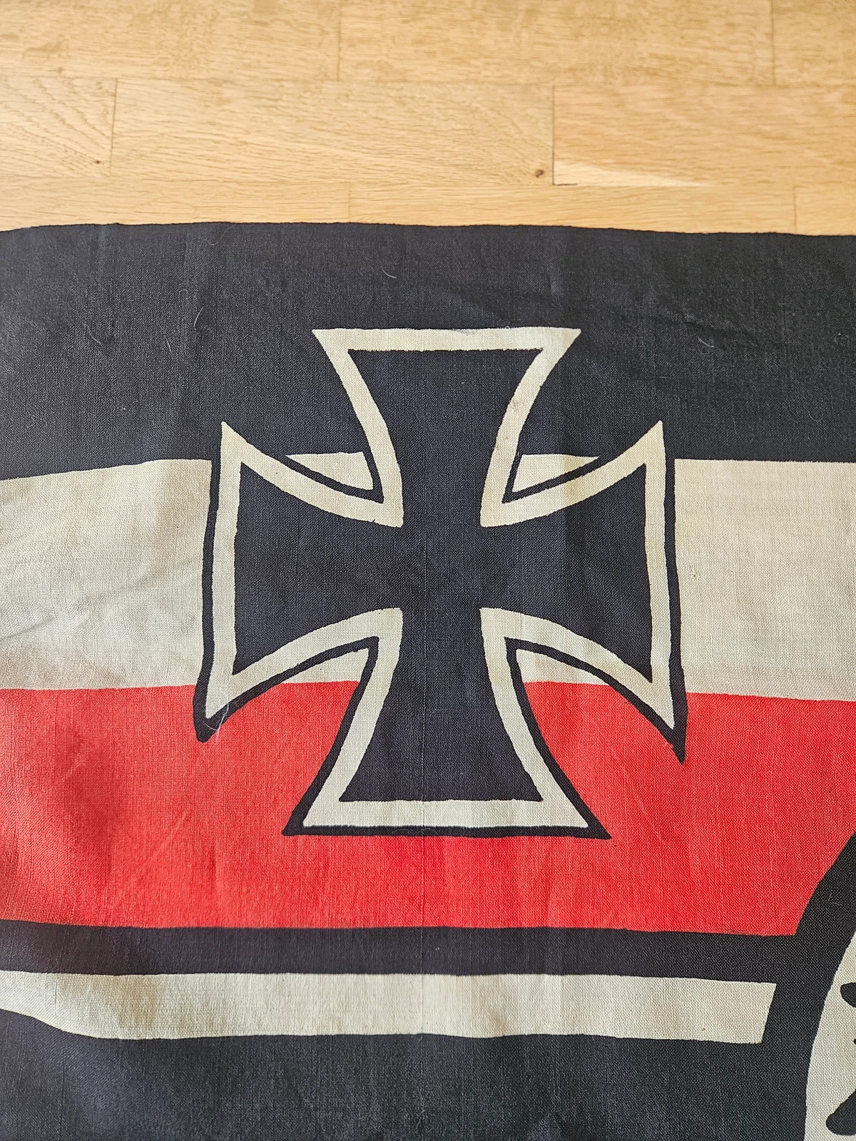 Iron Cross in the canton — detail with fuller limbs typical of interwar prints.