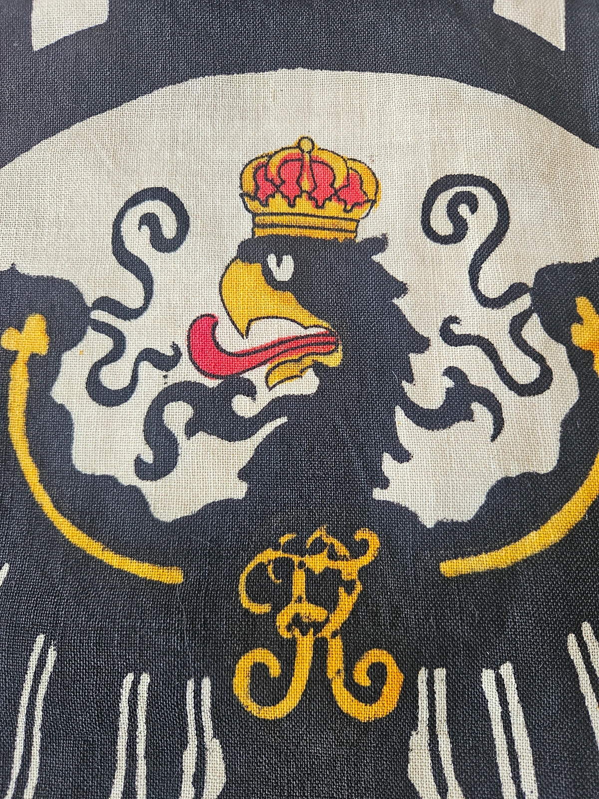 Eagle head, crown and tongue — close-up.