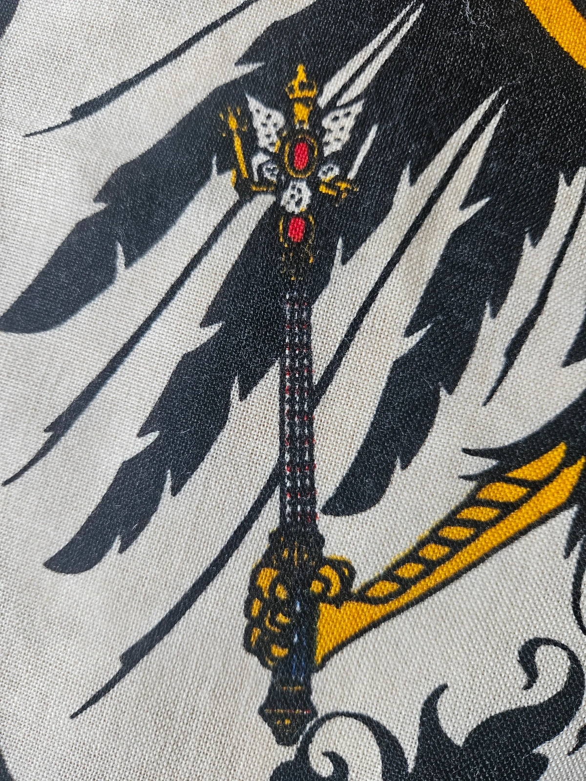 Scepter head — winged device with stacked red ovals