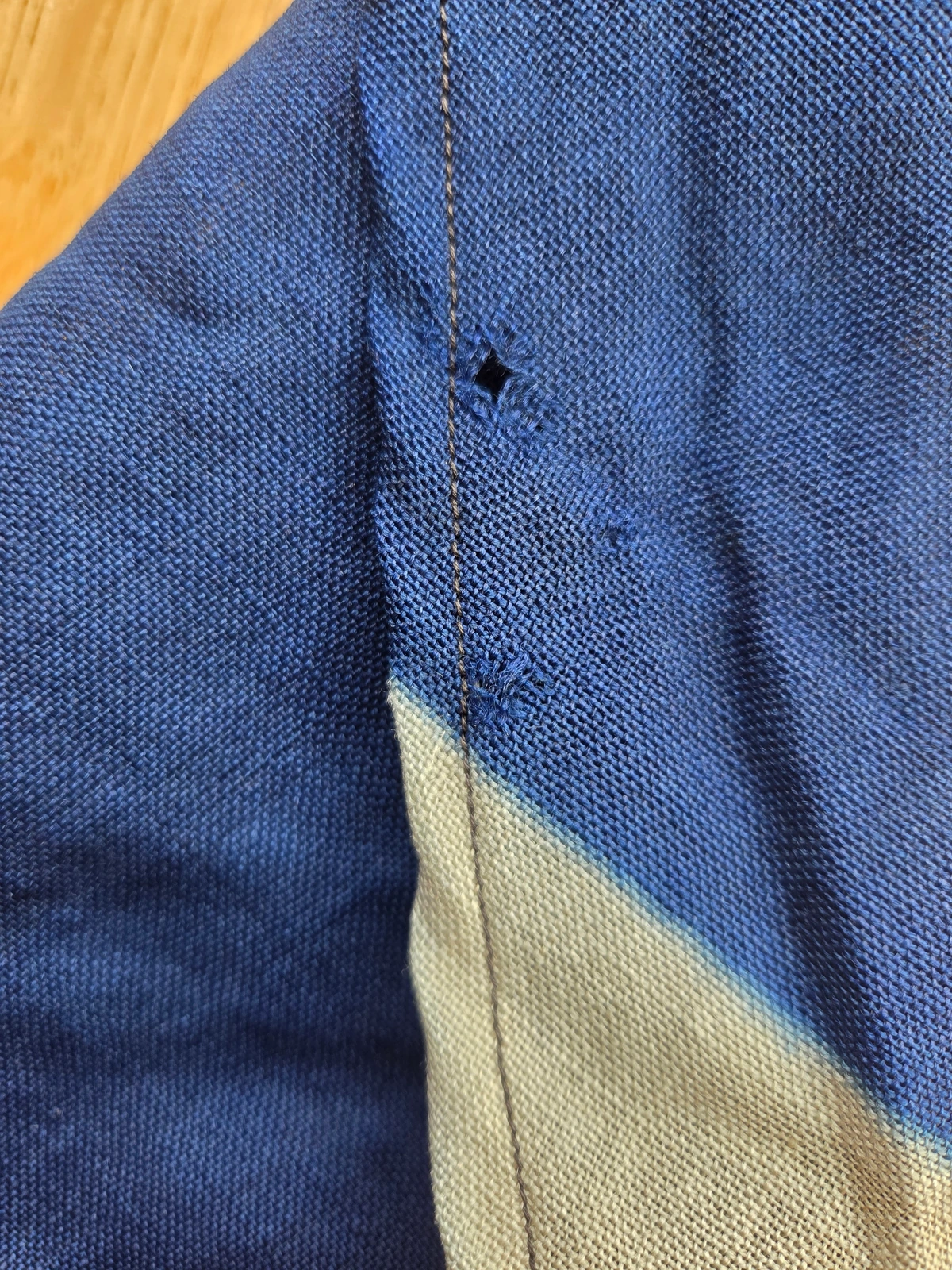 Tail leading edge stitching (front)