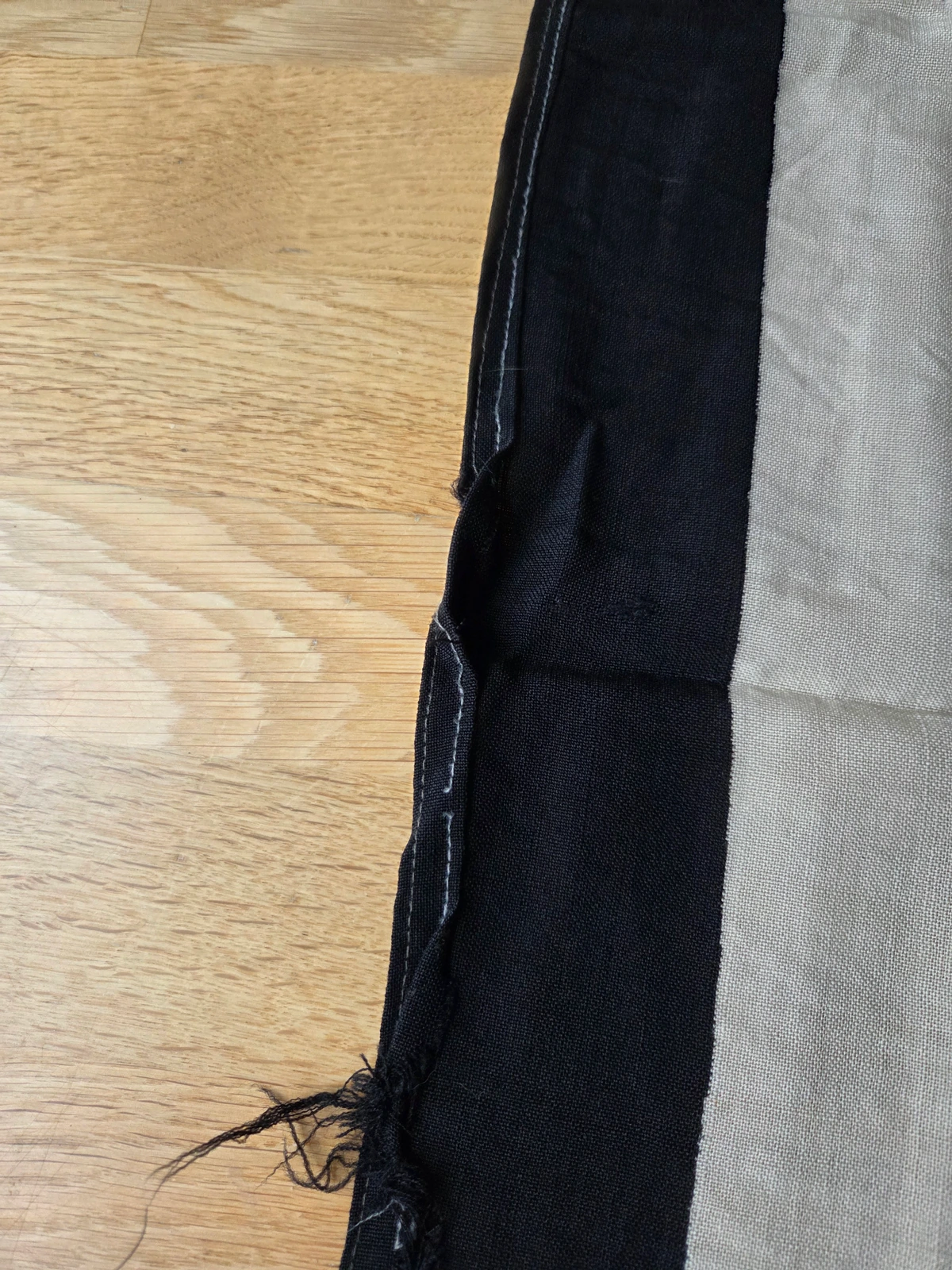Detail of black border seam and stitching
