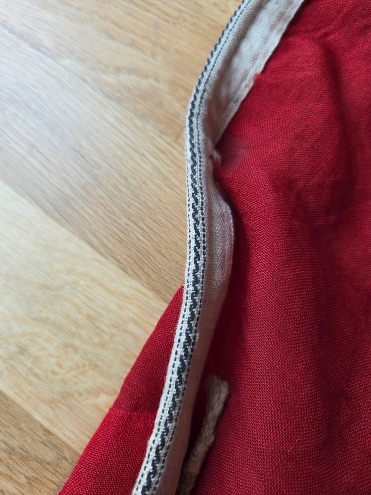 Hoist sleeve in thick cotton canvas with inner rope visible and “railroad” stitch pattern.