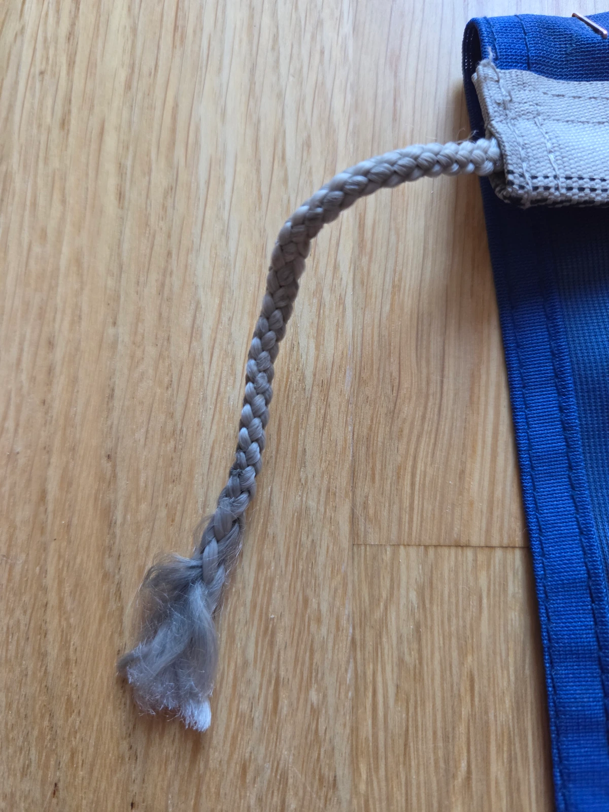 Lower hoist rope tail with grey braided synthetic cord