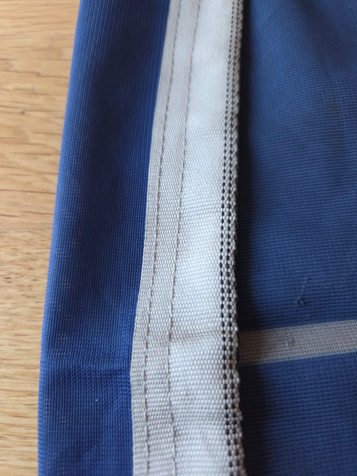 Grey synthetic hoist webbing with triple rows of stitching