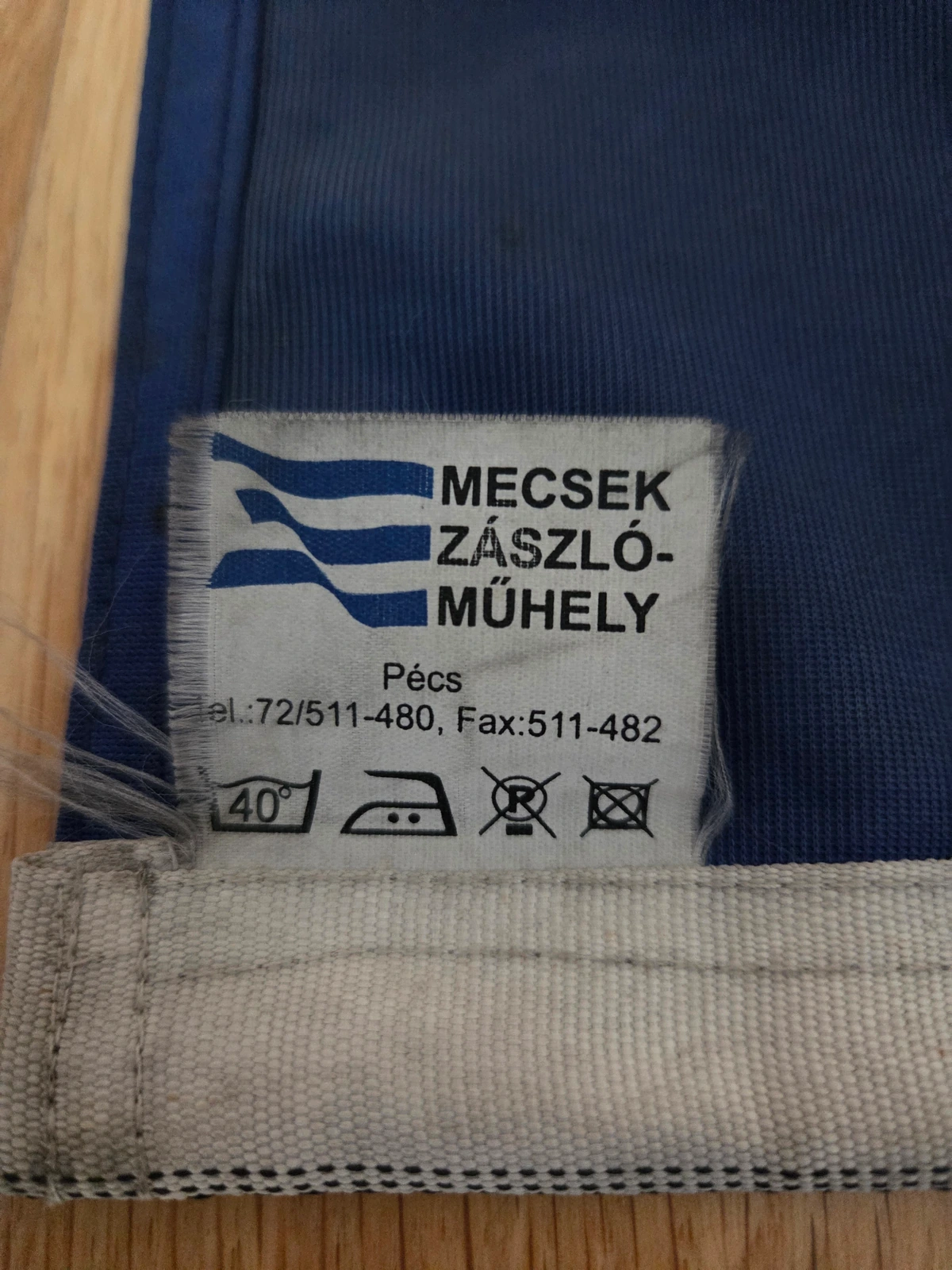 Manufacturer label from Mecsek Zászlóműhely, Pécs, sewn into the hoist webbing