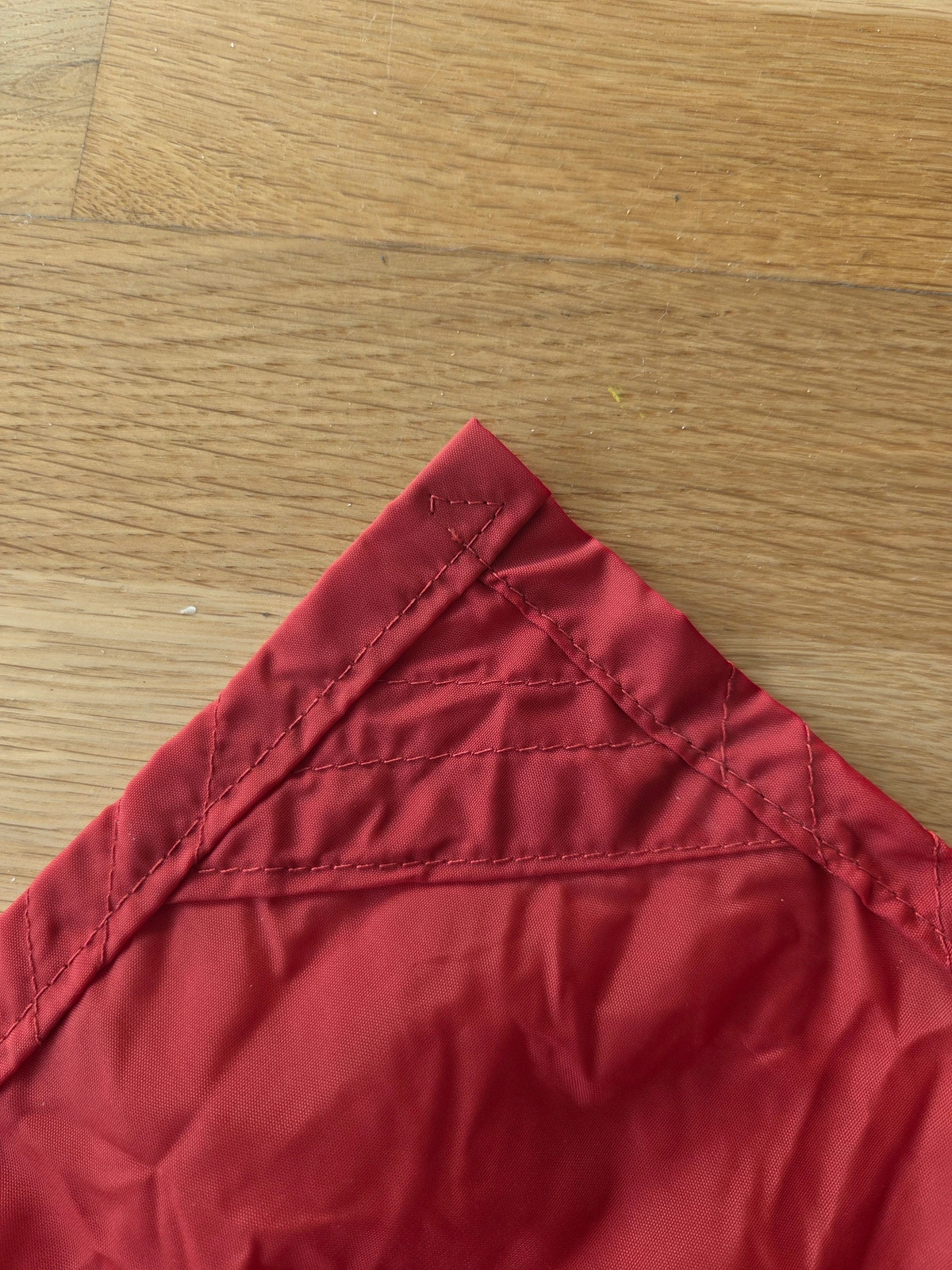 Corner reinforcement, reverse side