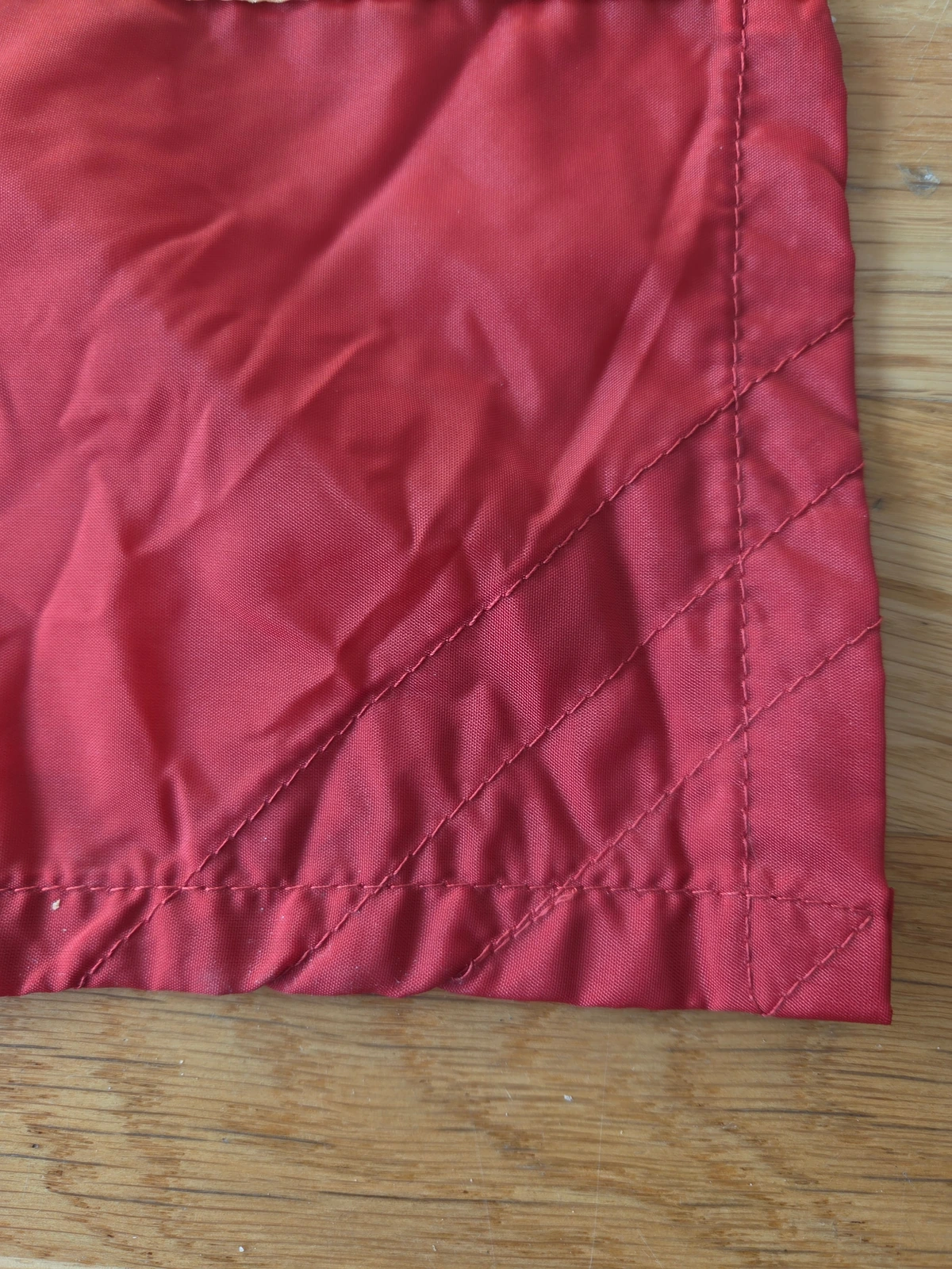 Corner reinforcement, front side