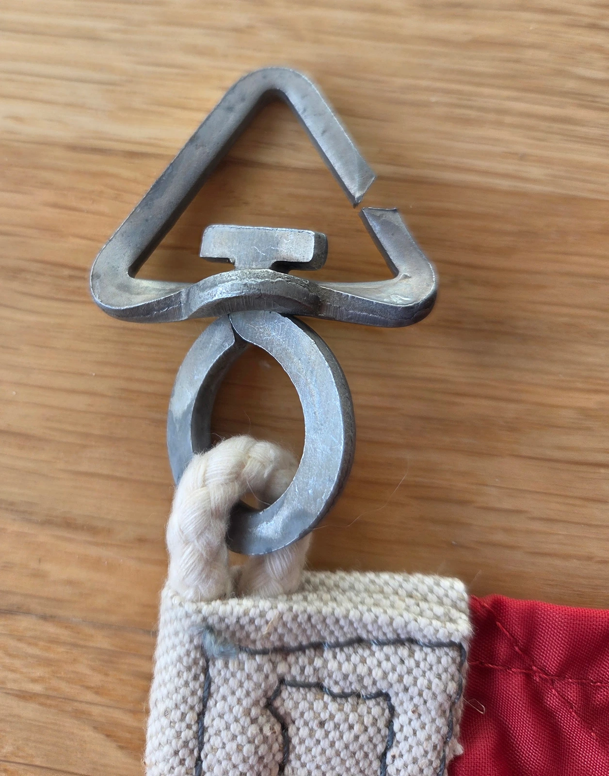 Upper triangular snap hook and halyard ring