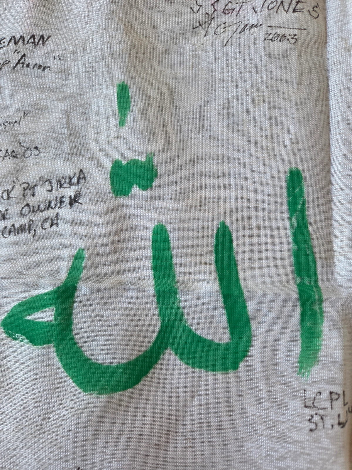 Painted Arabic takbir on the obverse of FG-061
