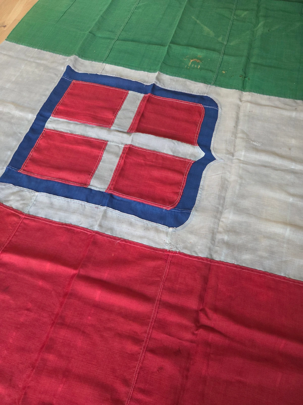 Close view of the sewn Savoy cross on FG-063