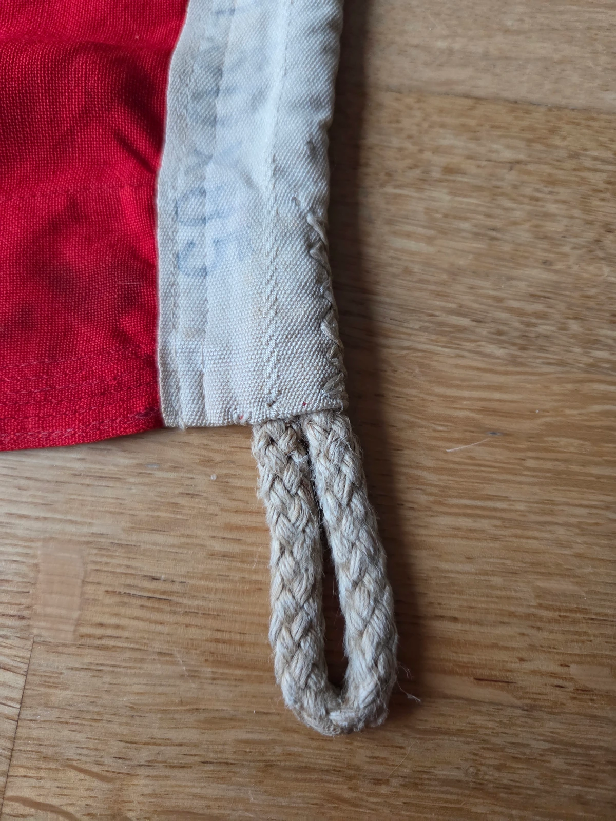 Hoist assembly — cotton header with integral braided rope loop
