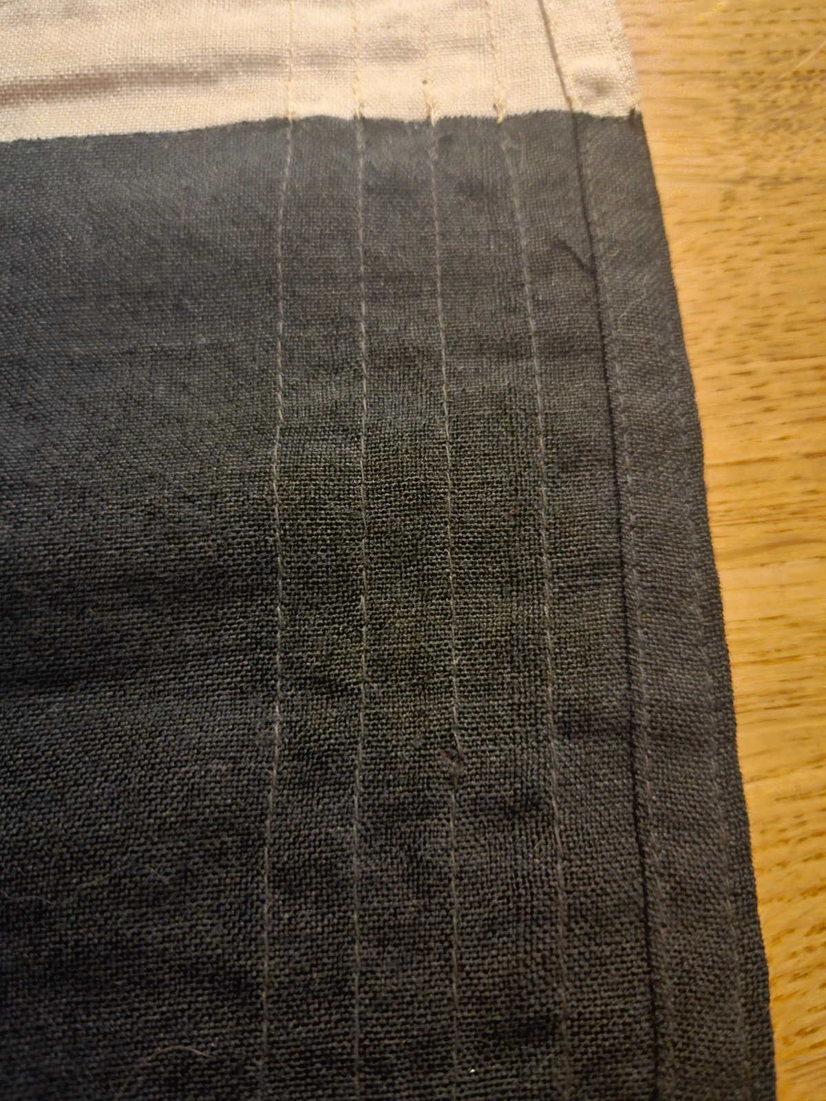 FG-007 stitching along black and white transition