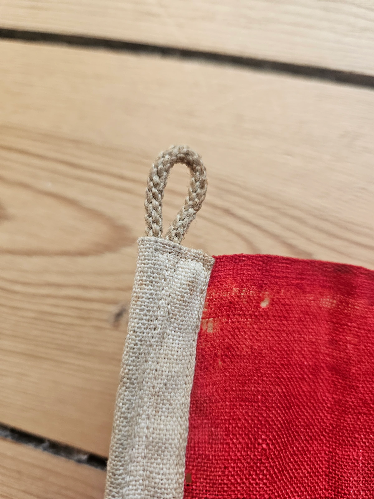 Rope hoist and reinforced heading