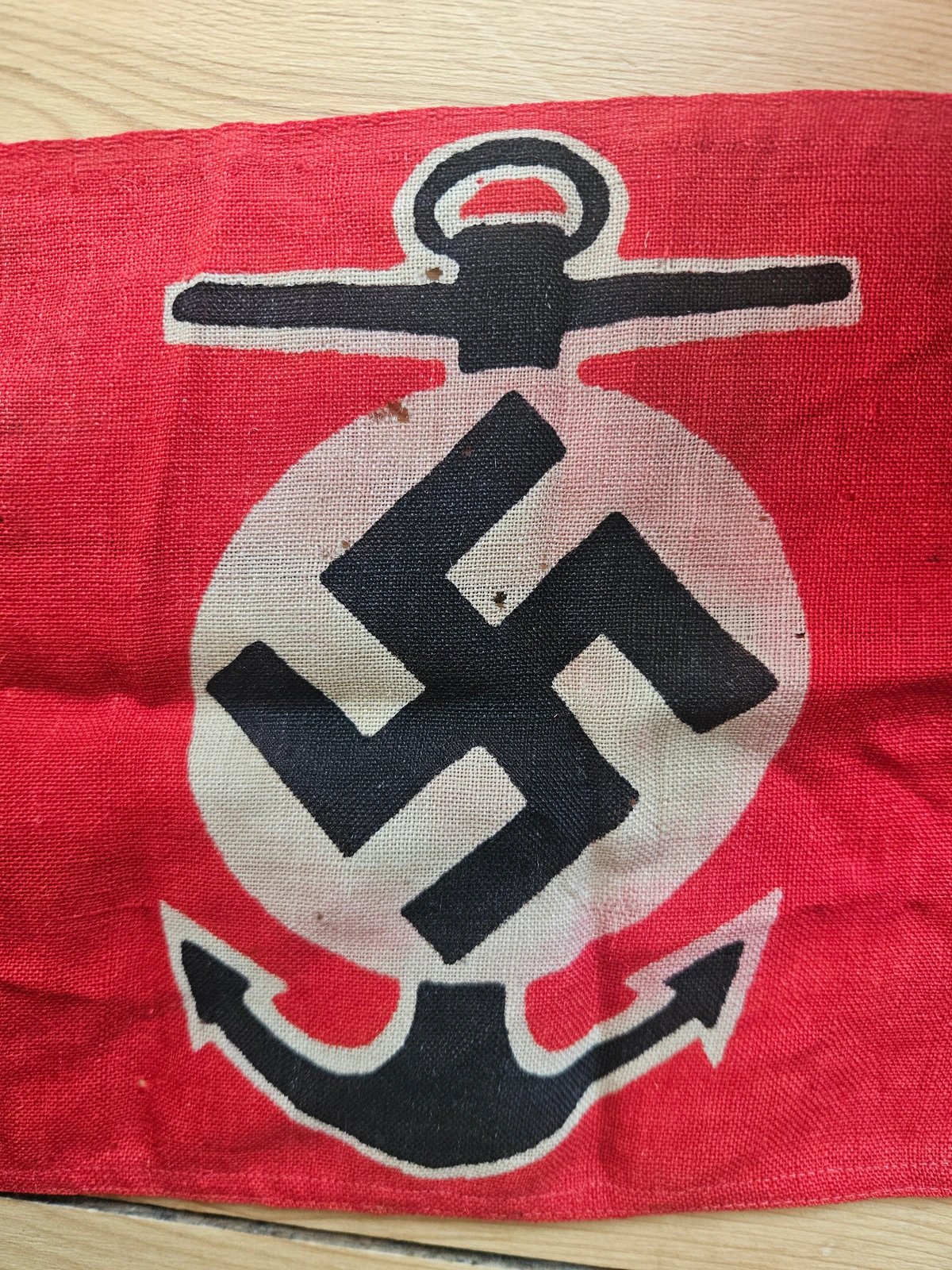 Anchor and swastika motif close-up